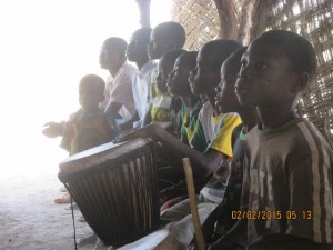 Kamkora Children drumming and praising 